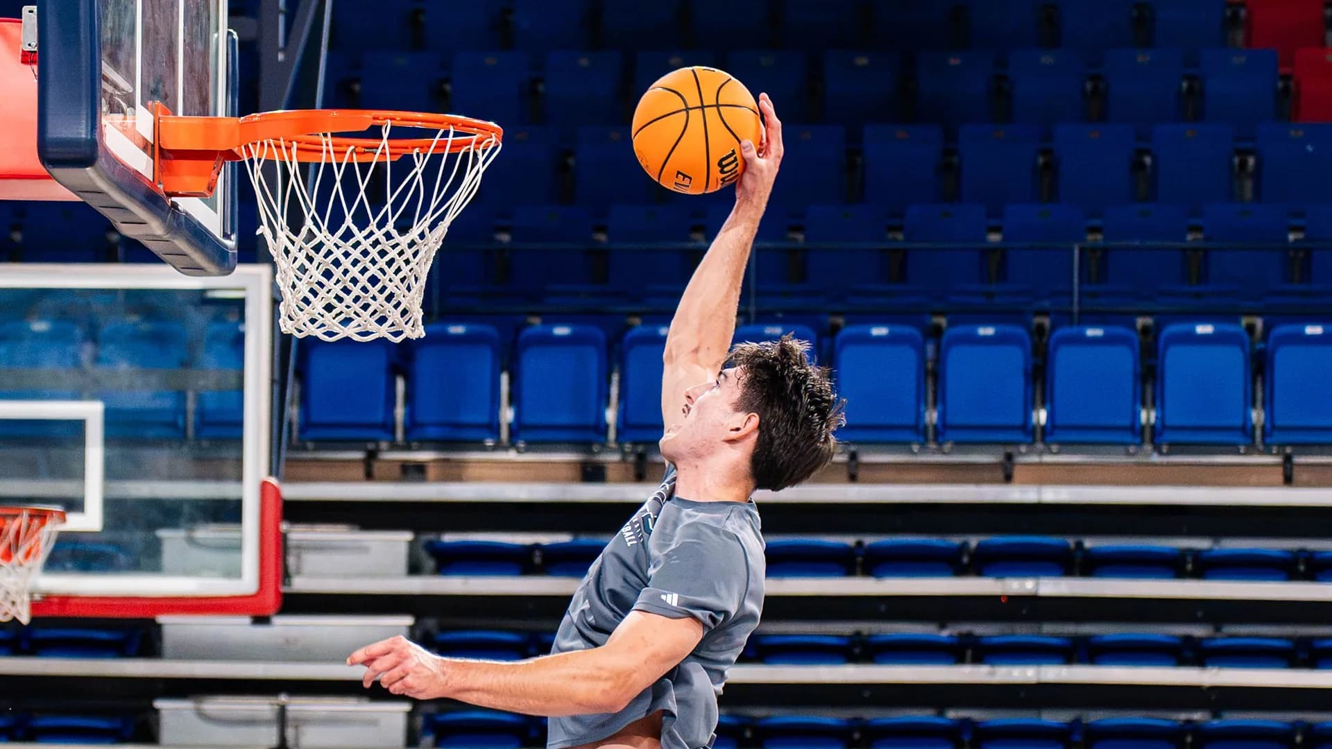 Kieran Mullen rising toward the basket at Florida Atlantic practice